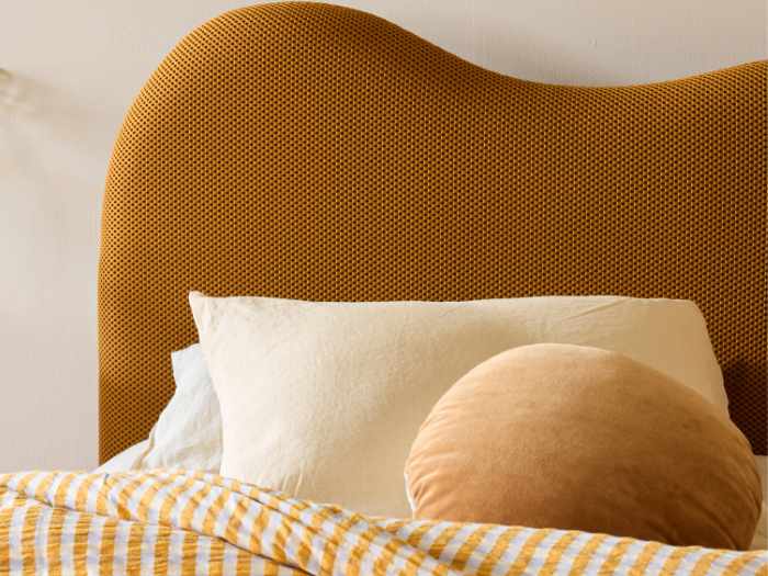 Close up photo of Amber King Single Storage Bed | Waffle Mustard Fabric