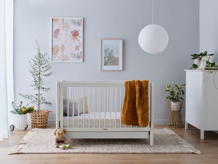 Photo of modern nursery containing Banskia 2PCE Hardwood Baby Cot with Storage and Changing Table Set in White