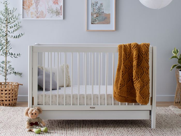 Photo of modern nursery containing Banskia 2PCE Hardwood Baby Cot with Storage and Changing Table Set in White