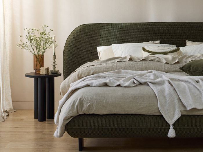 Close up photo of Berlyn King Bed | Olive Green Fabric