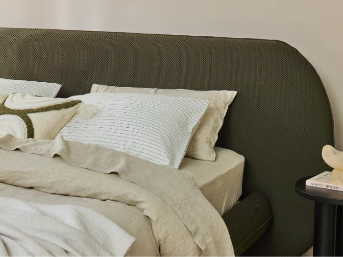 Close up photo of Berlyn King Bed | Olive Green Fabric