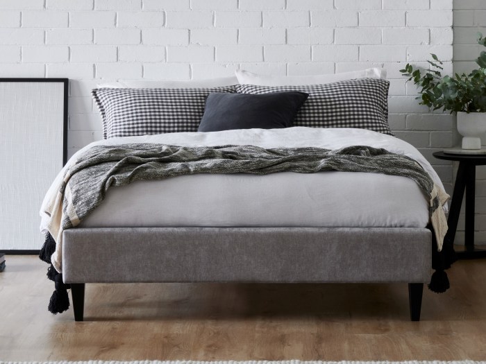 Modern bedroom containing Cannes 2PCE upholstered headboard and bed base in grey