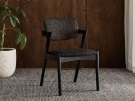 Modern dining room containing Bella Black Hardwood Dining Chair with Black Fabric.