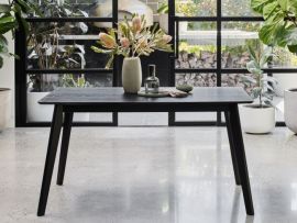 Modern dining room with Cannes black hardwood dining table