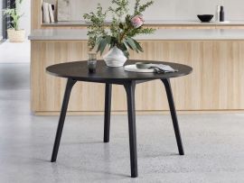 Modern dining room containing Cannes Round Black Hardwood Dining Table