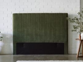 Modern bedroom containing Cannes queen upholstered headboard in green