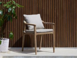 Modern outdoor space containing Caracas Acacia Outdoor Dining Chair | Light Brown Fabric
