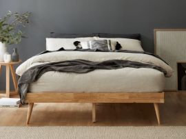Modern bedroom containing Franki double bed base in natural hardwood