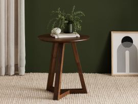 Modern living room containing Franki round hardwood side table in walnut