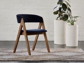 photo of Gaudi dining chair in walnut with navy fabric