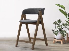 photo of modern dining room featuring gaudi hardwood counter stool in walnut finish and eco-friendly charcoal fabric