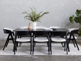 modern dining room containing gaudo 9PCE hardwood dining set in black and beige fabric