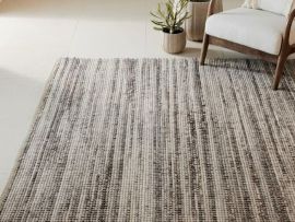 Close up picture of Hayden Area Rug in colour stone in a modern living room