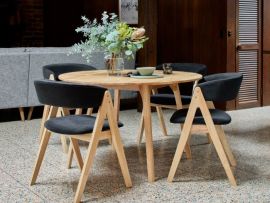 Photo of modern dining room containing Oslo 5PCE hardwood dining set in natural and black