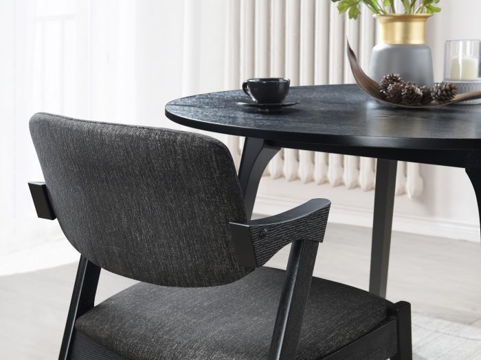 Modern dining room containing Bella Black Hardwood Dining Chair with Black Fabric.
