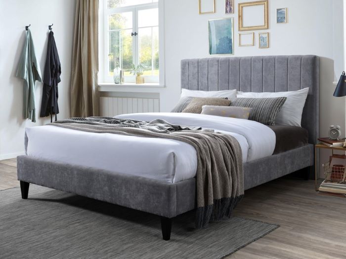 Modern bedroom containing Cannes 2PCE upholstered headboard and bed base in grey
