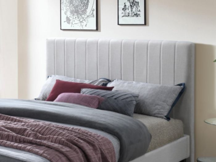 Modern bedroom containing Cannes double upholstered headboard in  beige