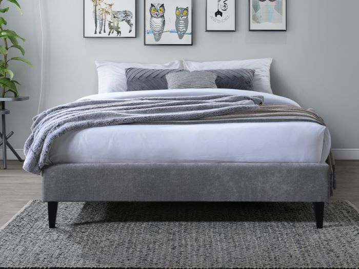Modern bedroom containing Cannes double upholstered bed base in grey
