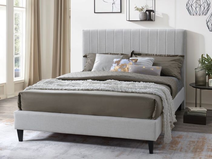 Modern bedroom containing Cannes queen upholstered bed base in  beige