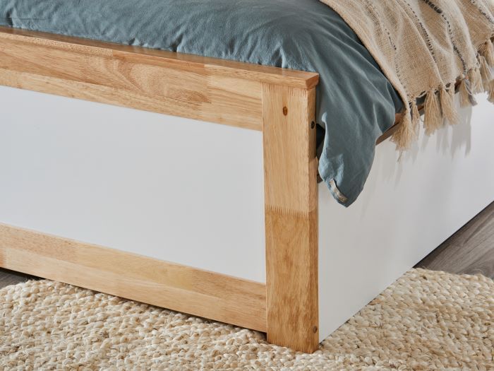 photo of the Coco Single Bed in natural hardwood with storage drawers