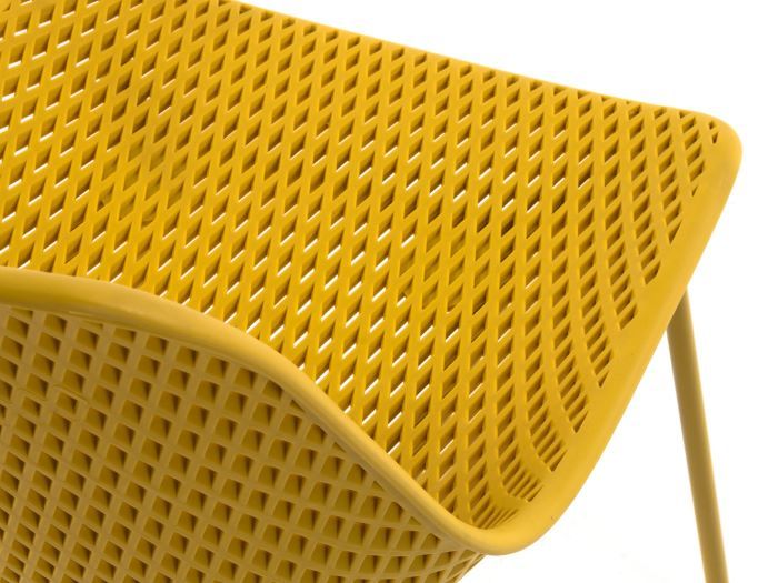 close up photo of the Darby outdoor dining chair in yellow with bucket seat