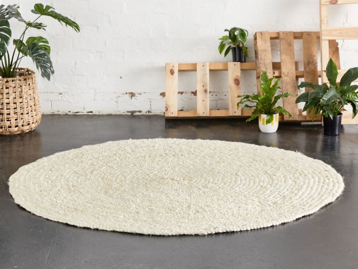 photo of eden round jute rug in cream on floor