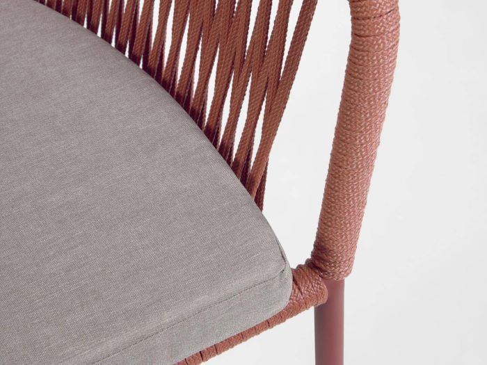 close up photo of Edith outdoor dining chair in terracotta