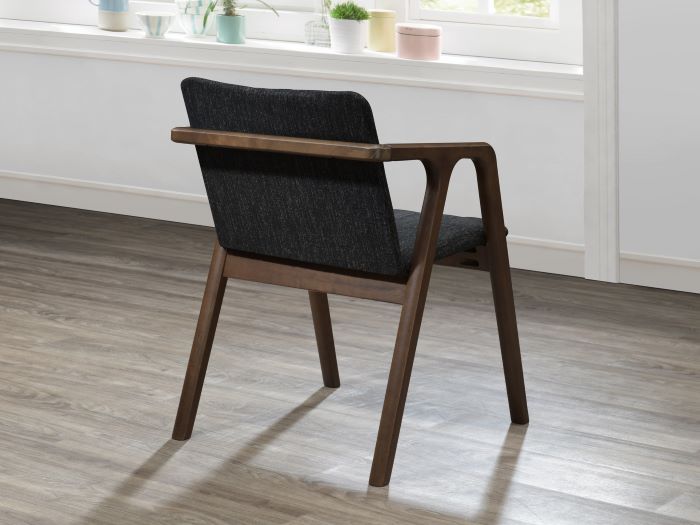 modern dining room containing elm hardwood chair in walnut and black fabric