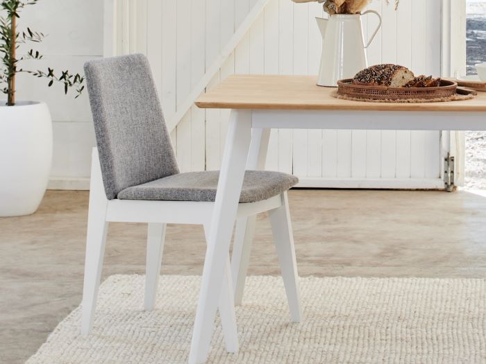 Close up of Finn Hardwood Dining chair in white and grey