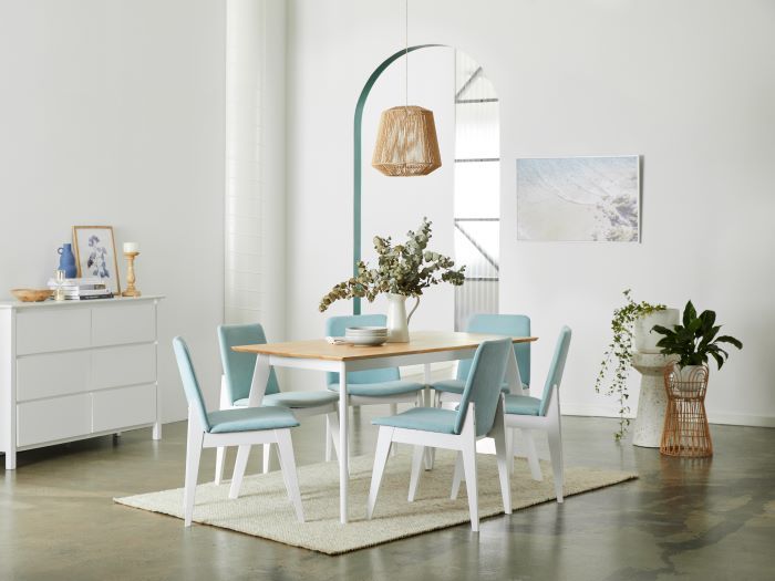 Rear view of modern dining room containing finn hardwood dining table in natural with finn hardwood dining chair in aqua