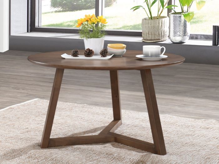 Modern living room containing Franki round hardwood coffee table in walnut