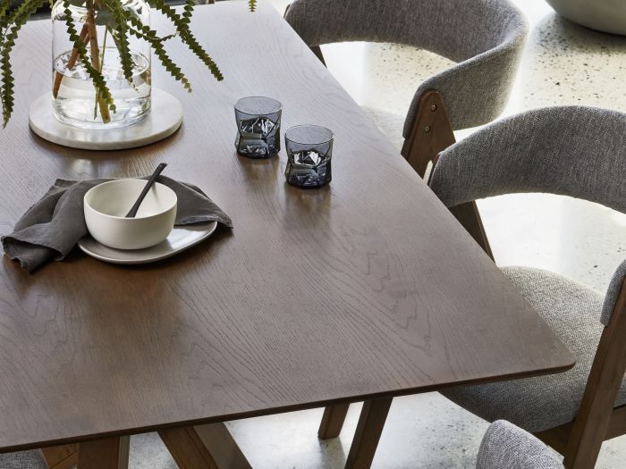Close up Photo of modern dining room containing Gaudi 7PCE Hardwood Dining Set in walnut and grey
