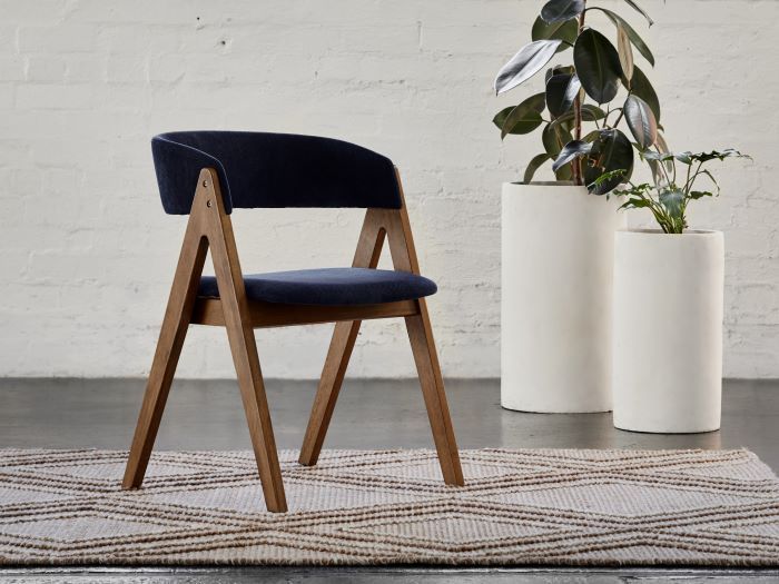 photo of Gaudi dining chair in walnut with navy fabric