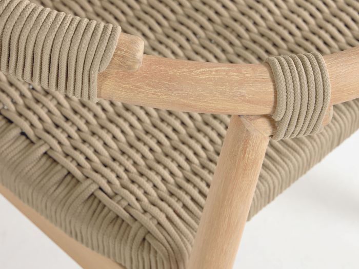 close up of modern idris outdoor dining chair with hardwood legs and beige rope seat