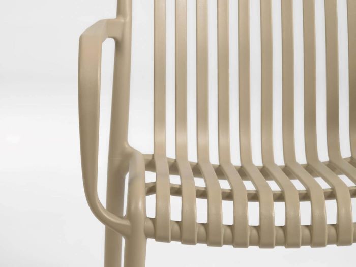 close up photo of Izzy outdoor dining chair in beige