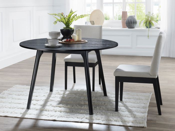 Modern dining room containing Kotor 5PCE Round Black Hardwood Dining Set with Beige Fabric