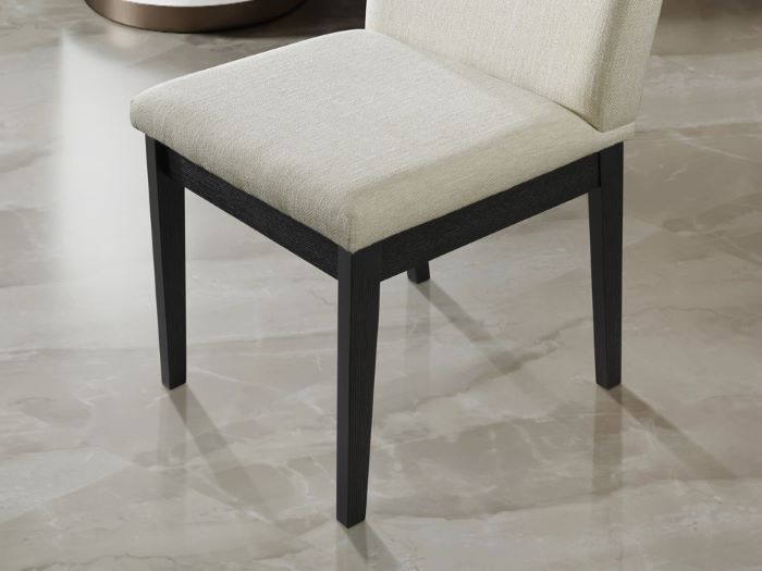 Close up of Kotor Upholstered Hardwood Dining Chair in  modern dining room