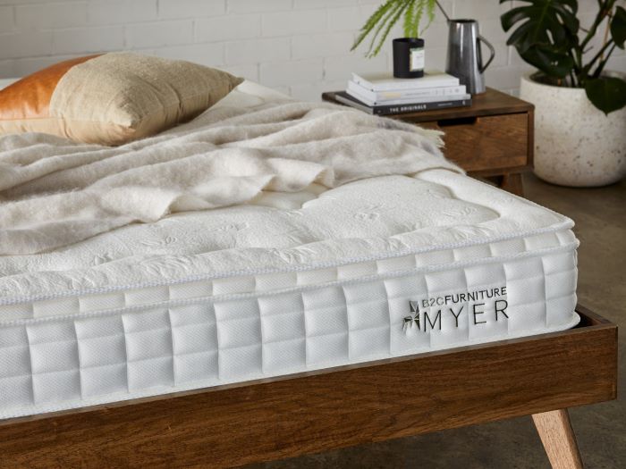 close up photo of myer king size mattress dressed