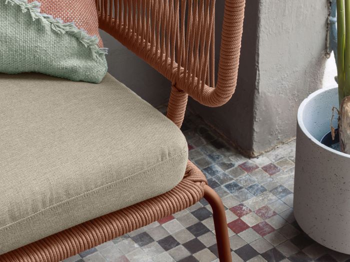 close up photo of Nadia outdoor armchair in terracotta