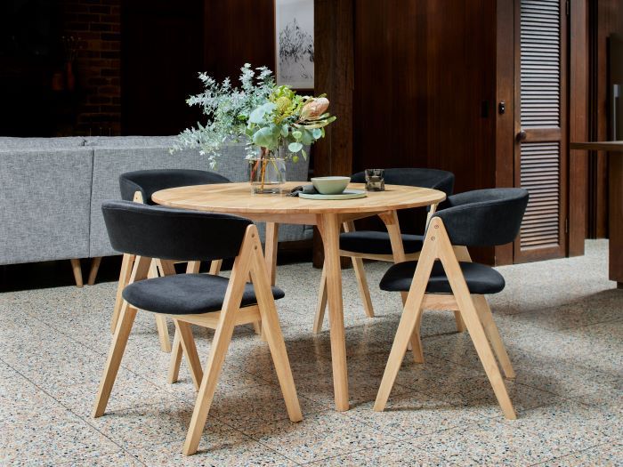 Photo of modern dining room containing Oslo 5PCE hardwood dining set in natural and black