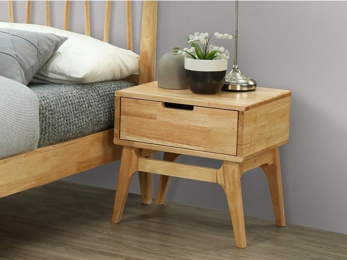 close up photo of modern bedroom with paris hardwood bedside table in natural