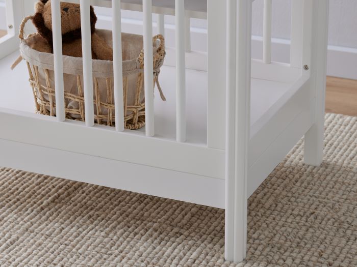 Close up photo of modern nursery with Rio Hardwood Changing Table in White