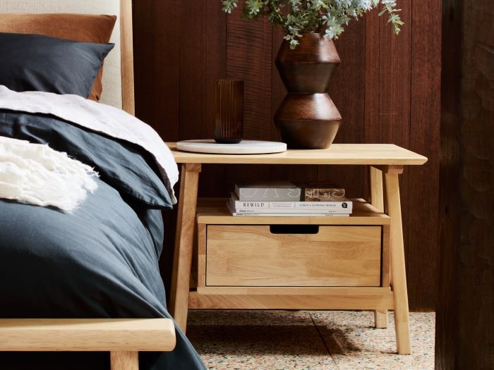 close up of room with modern bedroom furniture containing Rome Bedside Table in Natural hardwood