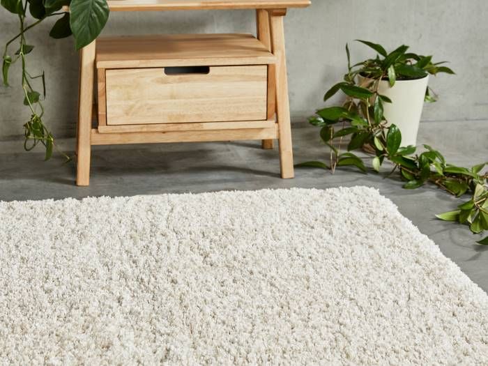 Close up of Skye Shag Pile Indoor Floor Rug with modern Rome Bedside Table