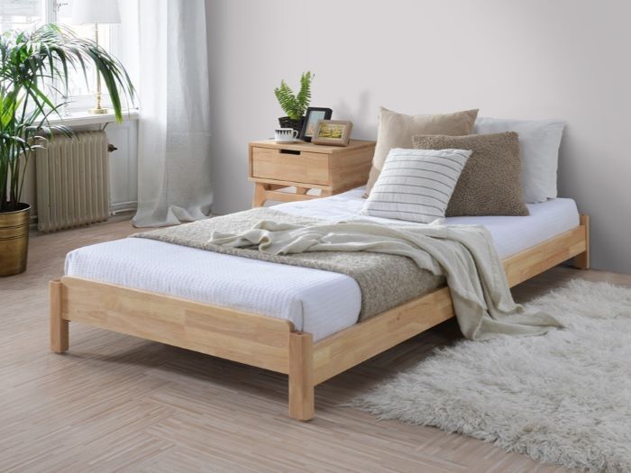 Modern bedroom containing Stax Single 2-in-1 Stacking Bed in Natural Hardwood.