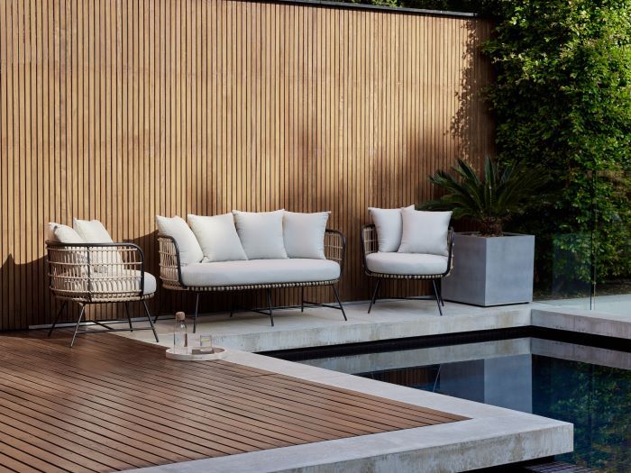 Outdoor cane lounge setting best sale