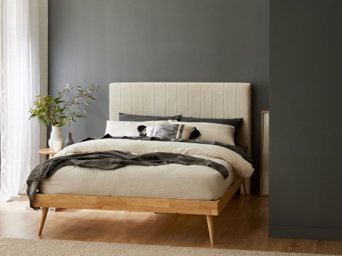 Modern bedroom containing Franki double bed base in natural hardwood