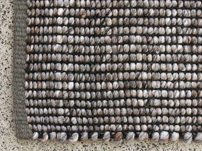 Close up picture of Hayden Area Rug in Chocolate in a modern living room