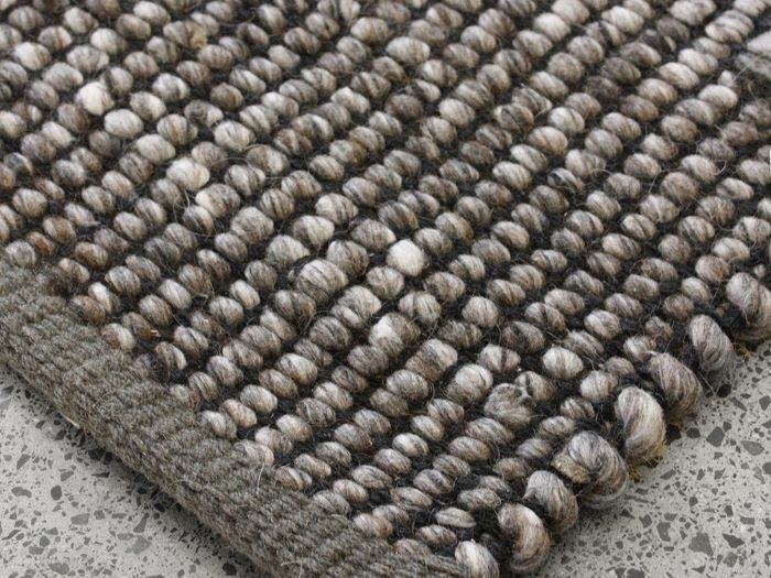 Close up picture of Hayden Area Rug in Chocolate in a modern living room