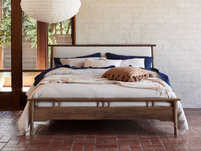 Front view of room with modern bedroom furniture containing Oslo Queen Bed Frame in walnut hardwood
